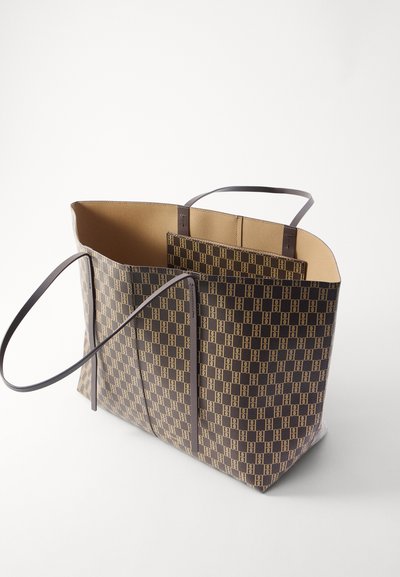 Brown patterned tote bag with two long handles. The exterior features a checkerboard design with light brown and dark brown colors.