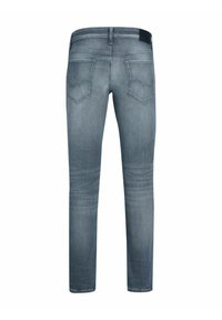 Úzké, šedé džíny z denimu s hladkou texturou, s dvěma zadními kapsami a štítkem na pase. Vybledlý design, rovný střih nohavic.