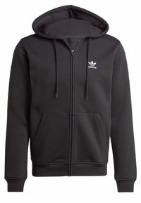 Černá mikina s kapucí na zip vyrobená z bavlněné směsi, se stahovací kapucí, předními kapsami a malým bílým logem Adidas na levém hrudníku.