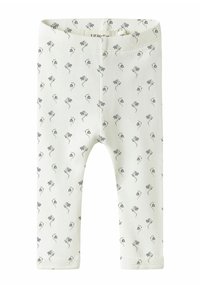 Witte legging met een bloemenpatroon in grijs. Gemaakt van zacht materiaal, met een comfortabele tailleband en enkelsluitingen.