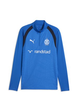 Niebieski sportowy top z długim rękawem z czarnymi panelami na ramionach, logo Puma, sponsorem Randstad oraz herbem klubu piłkarskiego Marsylia z przodu.