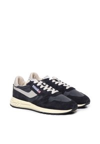 Sneakers blu navy realizzati in suede e pelle, con accento grigio, suola crema e lacci bianchi. Presentano un logo sulla linguetta.