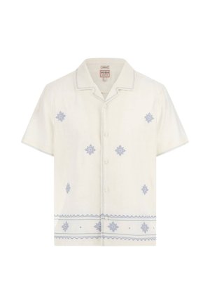 Short-sleeve white shirt with blue embroidery. Features a collared neckline and buttons, textured fabric, and decorative patterns on front and hem.