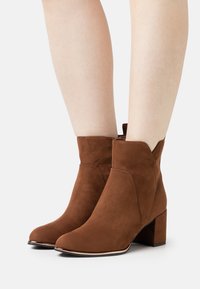 Marco Tozzi Bottines - cognac