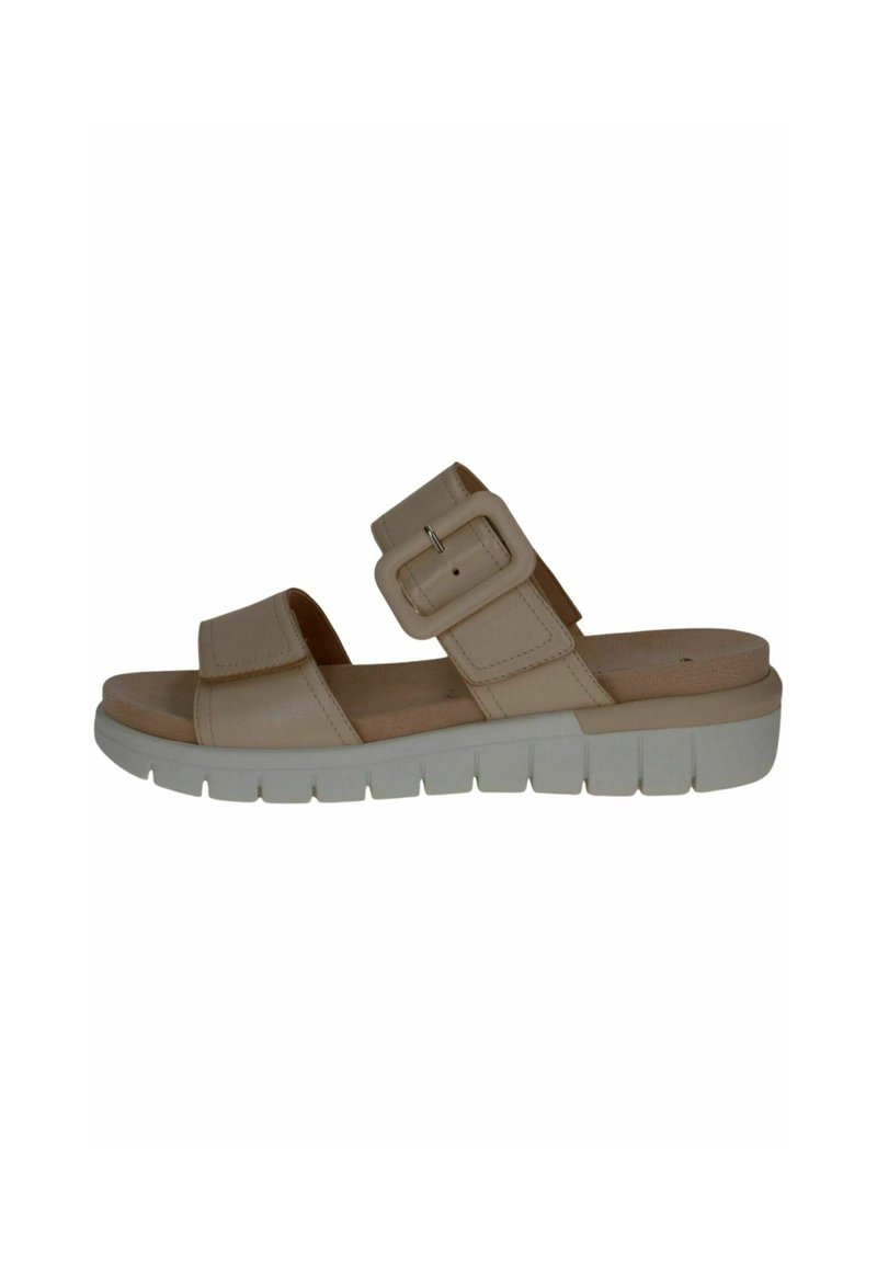 Sandali scivolati beige con due cinturini regolabili con dettagli in fibbia, una soletta imbottita e una suola in gomma bianca con texture scanalata.