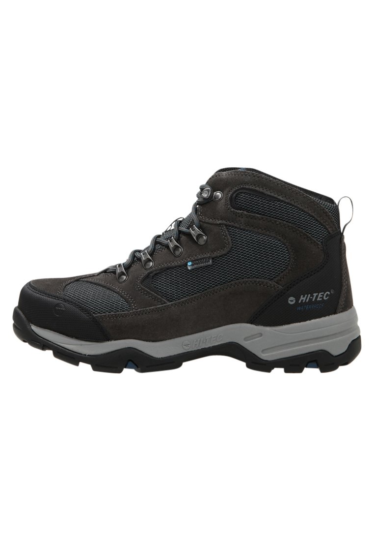 Mid-top hiking boots in grey and black synthetic materials with mesh panels, lace-up closure, reinforced toe, and rugged outsole for traction.