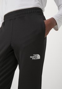 The North Face PANT - Treniņtērpa apakšdaļas - black