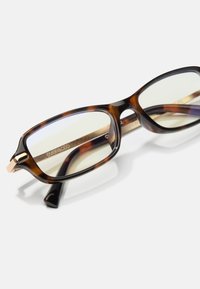 Tortoiseshell naočale s pravokutnim lećama i elegantnim dizajnom. Naglašene zlatnim dijelovima na drškama, s teksturiranim unutarnjim dijelom.