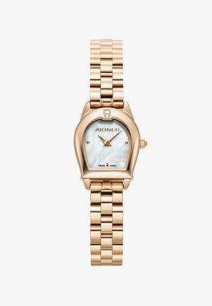 Ruusukullan värinen ruostumaton teräs kello, jossa on kaareva kuori, helmiäispintainen kellotaulu ja linkitetty ranneke. Sisältää Aigner-brändäystä ja Sveitsissä valmistettu -merkinnän.