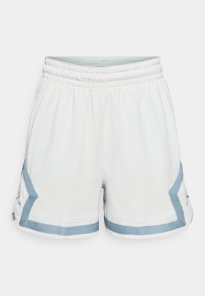 Hvite trening-shorts med teksturert stoff, blå detaljer på sidene og elastisk midje for komfort.