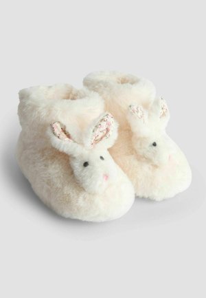 Uduvad, heledat roosat värvi tossud, mis on kujundatud küülikute sarnaselt, lillemustriliste kõrvade, mustade nööp-silmade ja pehme plush-kattega.