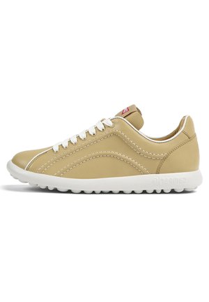 Beige leather sneaker with white rubber sole, contrasting stitching, and round laces; features a tab with logo on the heel.