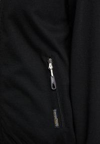 Schmuddelwedda Vodotěsná bunda - black