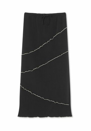 Black skirt with a drawstring waist, featuring scalloped edges and contrasting white wavy lines as decorative accents. Smooth, stretchy fabric.