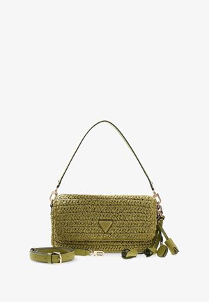 Sac bandoulière en tissu vert olive avec bandoulière amovible, petit logo triangulaire et accents de pompons floraux sur fond blanc.