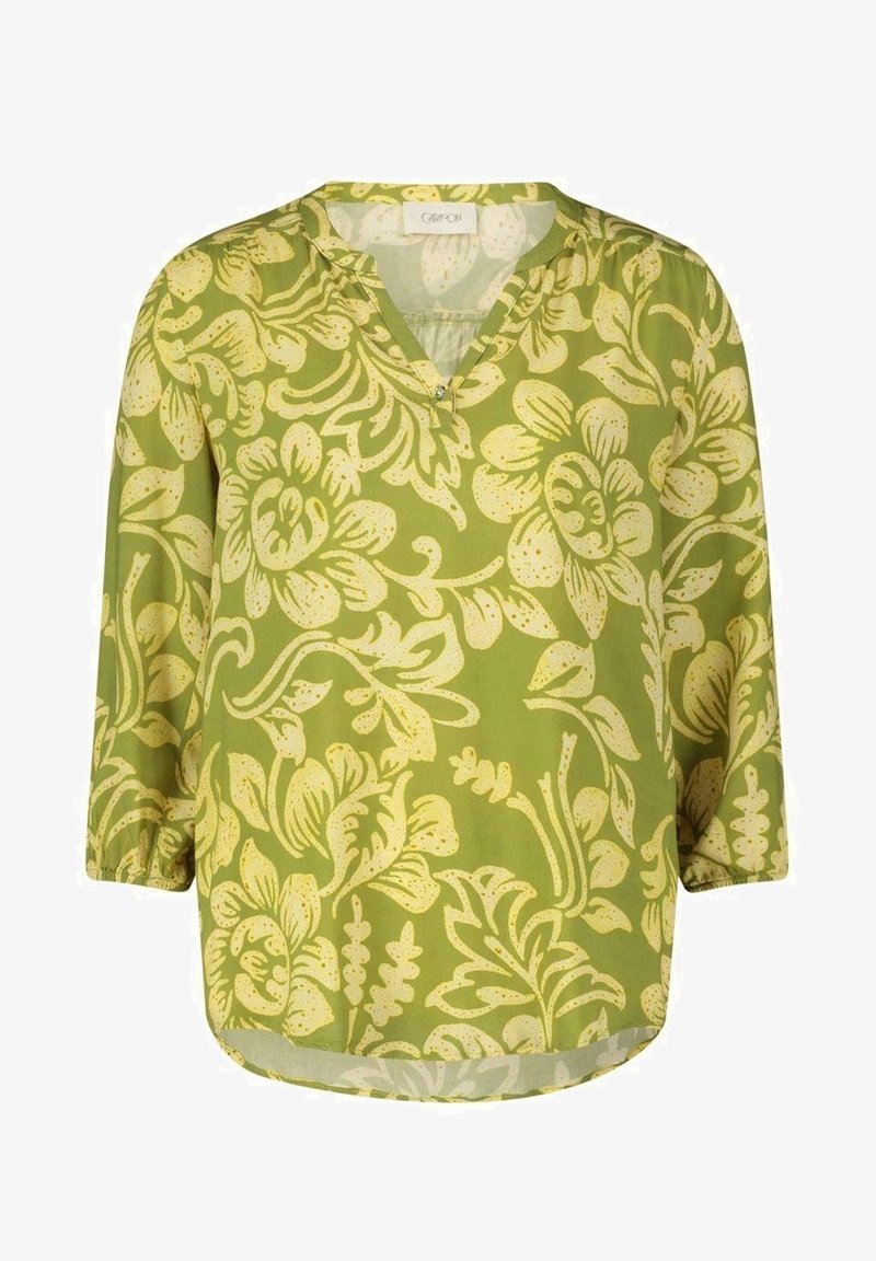 Blouse florale verte avec décolleté en V, manches trois-quarts et coupe décontractée. Dispose d'un motif floral jaune pâle et d'un tissu doux et texturé.