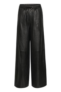 Black leather wide-leg pants with an elastic waistband and drawstring. Smooth texture with minimal seams and a relaxed fit design.
