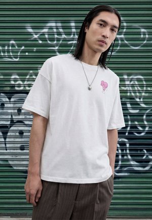 KEEP CHASING UNISEX - Print T-shirt - white