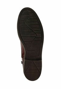Bottines en cuir marron avec une semelle en caoutchouc texturé présentant un motif en zigzag, taille marquée 37, dotées d'accents latéraux et d'un bout arrondi.