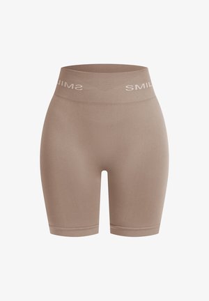 Bermuda-shortsit vaaleanruskeana, leveällä vyötärönauhalla, jossa on teksti "HYMYYYY". Valmistettu sileästä ja joustavasta kankaasta.