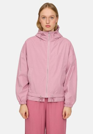 Helle pinke, zipfelbare Jacke mit Kapuze, elastischen Bündchen, Fronttaschen und verstellbaren Kordeln am Saum. Glattes Material, lockere Passform.