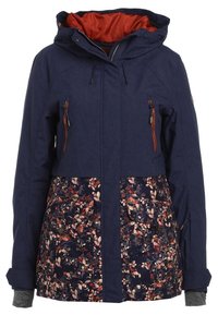 Veste à capuche bleu marine avec la moitié inférieure à motif floral, poches à fermeture éclair rouges, et poignets intérieurs gris visibles aux extrémités des manches.