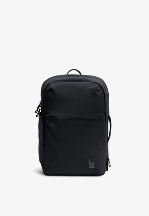 Czarny prostokątny plecak z przednią kieszenią na zamek, bocznymi i górnymi uchwytami oraz logo "GOT BAG" w dolnym prawym rogu.