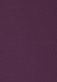 Textured purple fabric with a ribbed pattern, evenly woven with fine lines, displaying a rich, deep color and soft texture.