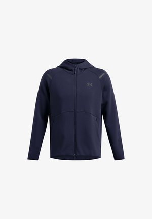 Marineblauer Zip-Hoodie aus weichem Stoff. Verfügt über eine Kapuze, Fronttaschen und Schulterakzente. Dezentes Logo auf der Brust.