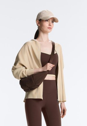OYSHO MINI QUILTED  - Umhängetasche - brown