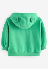 Felpa verde con cappuccio, caratterizzata da un tessuto testurizzato, maniche corte a palloncino e due piccole decorazioni a forma di orecchie sul cappuccio.