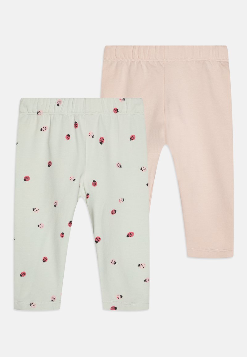 To par med tights: en i pastellgrønn med marihøneprint, den andre i ensfarget lys rosa, begge med elastisk midjebånd.