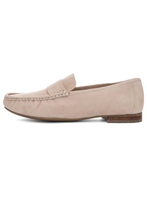 Light beige suede men's loafer with stitched moc toe, low wooden heel, and a strap across the upper.