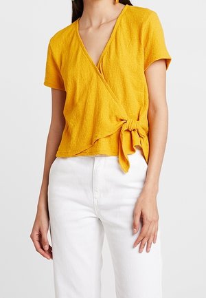 T-shirt print - mustard yellow