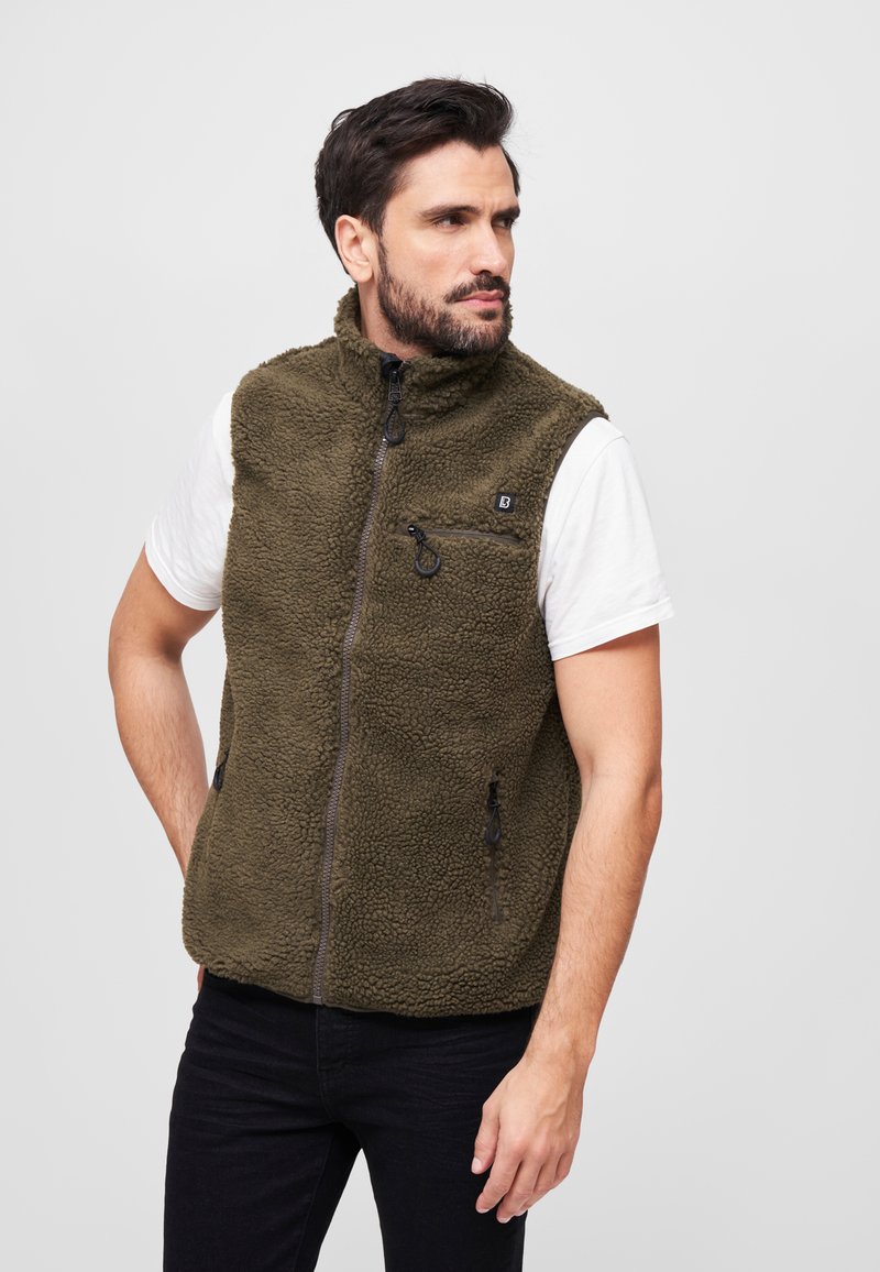Olivenfarbener Fleece-Weste mit Reißverschluss vorne, hohem Kragen und zwei seitlichen Taschen. Verfügt über ein strukturiertes Material und ein kleines Logo auf der Brust.