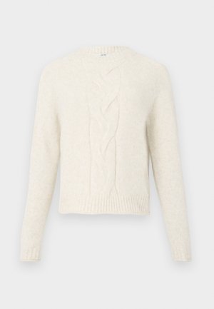 Kremni pleteni pulover z dolgimi rokavi in osrednjim vertikalnim vzorcem z žičnato pletenico na sprednji strani ter rebrastimi manšeti in robom.