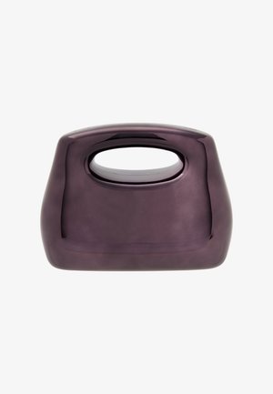 Fioletowy ceramiczny obiekt w kształcie torby z gładką, błyszczącą powierzchnią i prostokątnym uchwytem wyciętym w kształcie. Prosty, nowoczesny design.