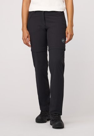 Pantalons de randonnée noirs, légers, zippables, avec une texture lisse, dotés d'un logo sur la cuisse gauche et de genoux articulés pour plus de mobilité.