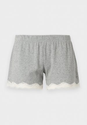 Szare szorty z prążkowanego dzianiny z elastycznym pasem w talii i białą falbaną z koronki na dolnej krawędzi.