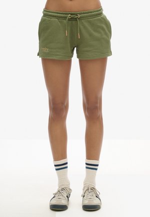 Groene katoenen korte shorts met een elastische tailleband, trekkoordsluiting en voorzakken. Opvallend bruin logo detail aan de linkerkant.