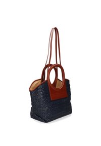 Borsa a spalla in tessuto blu navy intrecciato con dettagli in pelle marrone, manici circolari e design a apertura superiore. L'interno è beige.