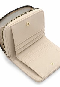 Compact beige leather wallet with a zip closure. Features multiple card slots and a snap button. Textured surface and gold-tone hardware.