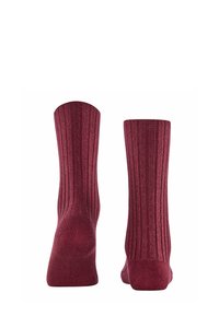 Calze bordeaux a coste con una texture liscia, alto risvolto e tallone e punta rinforzati, adatte per abbigliamento casual o formale.