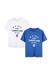Dos camisetas: una blanca y una azul. Ambas tienen mangas cortas, cuellos redondos y gráficos frontales con "TIMBERLAND" y el logo del árbol.
