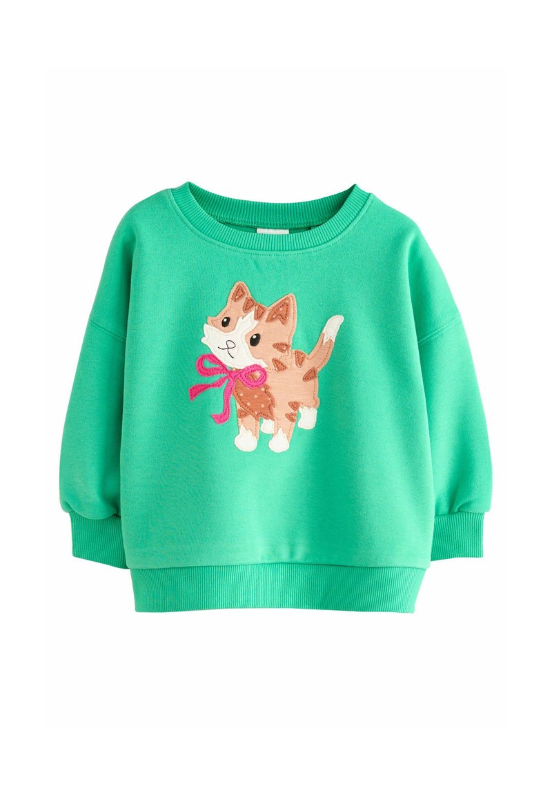 Felpa verde con illustrazione di un gatto con un fiocco rosa. Realizzata in tessuto morbido, presenta un collo rotondo e polsini a coste.