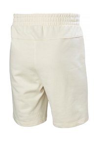 Crème-kleurige shorts met een zachte textuur, elastische tailleband en een ontspannen pasvorm, met platte naden en een eenvoudig ontwerp.