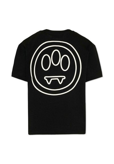 Czarna koszulka z krótkim rękawem z dużym białym nadrukiem na plecach przedstawiającym okrąg z trzema owalnymi kształtami nad dwoma kłówkami przypominającymi zęby.