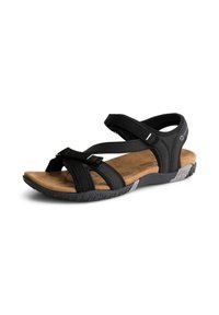 Musta sandaalit useilla remmeillä, pehmeä beige pohjallinen, teksturoitu kumipohja ja säädettävä sulku varman istuvuuden takaamiseksi.