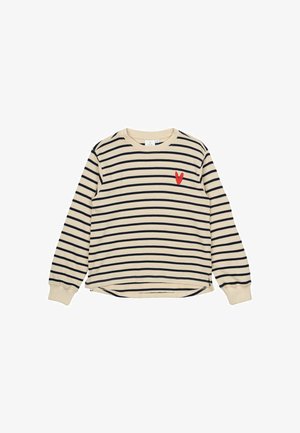 Gestreiftes Langarmshirt in Creme und Marineblau, mit einem roten Herzpatch auf der Brust. Weiches Material mit lockerer Passform und abgerundetem Saum.