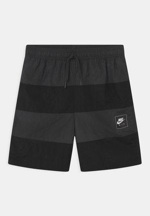 Sorte Nike Air badeshorts med elastisk linning, snøre og horisontalt paneldesign.